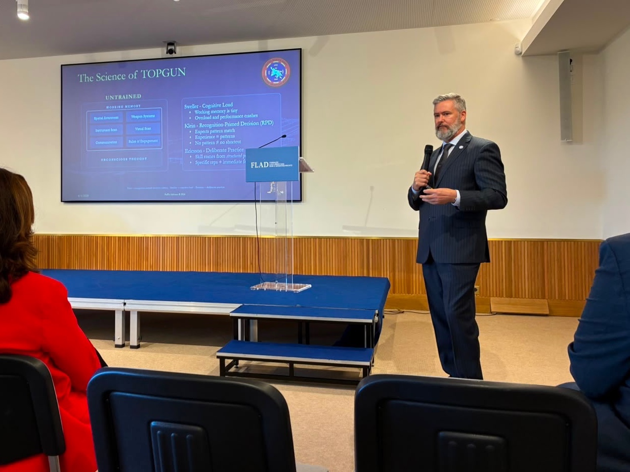Ed Chandler speaking to an audience at OSAC Lisbon